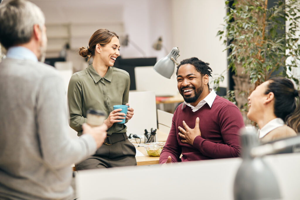 Happy Team of Workers Laughing